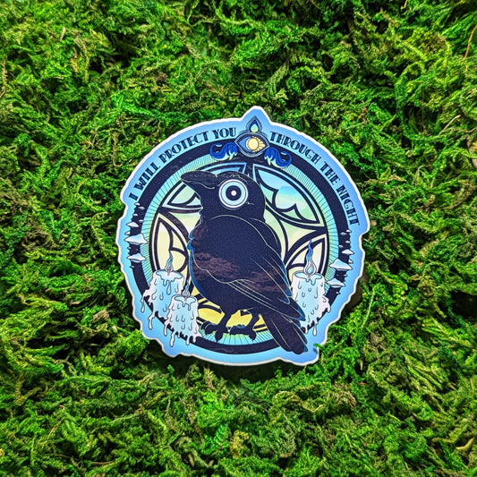 Photograph of a mossy background with a vinyl sticker of a raven in front of an ornate window at sunset. The colors are cool blues, greens, and highlights of yellow. Over the window it says “I will protect you through the night.”