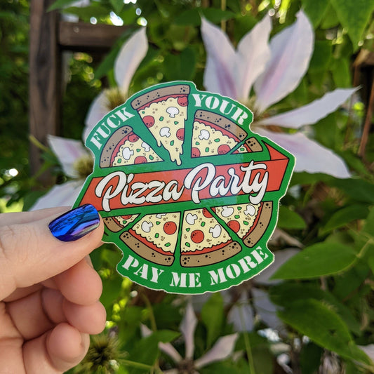 A photograph of a vinyl sticker being held in front of a clematis plant. The vinyl sticker is a pizza with a banner around it that says, “Fuck your pizza party, pay me more!”