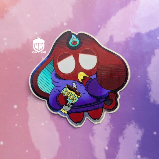 A photograph of a vinyl sticker against a pink and purple background. The sticker features Jack, the lazy demon. The sticker is approx 3 by 3 inches and is made of super durable waterproof vinyl.