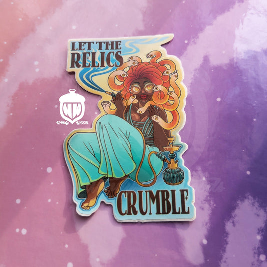 A photograph of a vinyl sticker against a pink and purple background. The sticker features Medusa lounging and smoking hookah. Around her it says, “Let the relics crumble.”