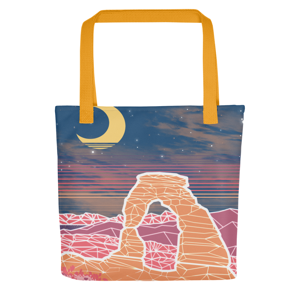 A graphic of a tote bag with vaporwave style Delicate Arch from Arches National Park.