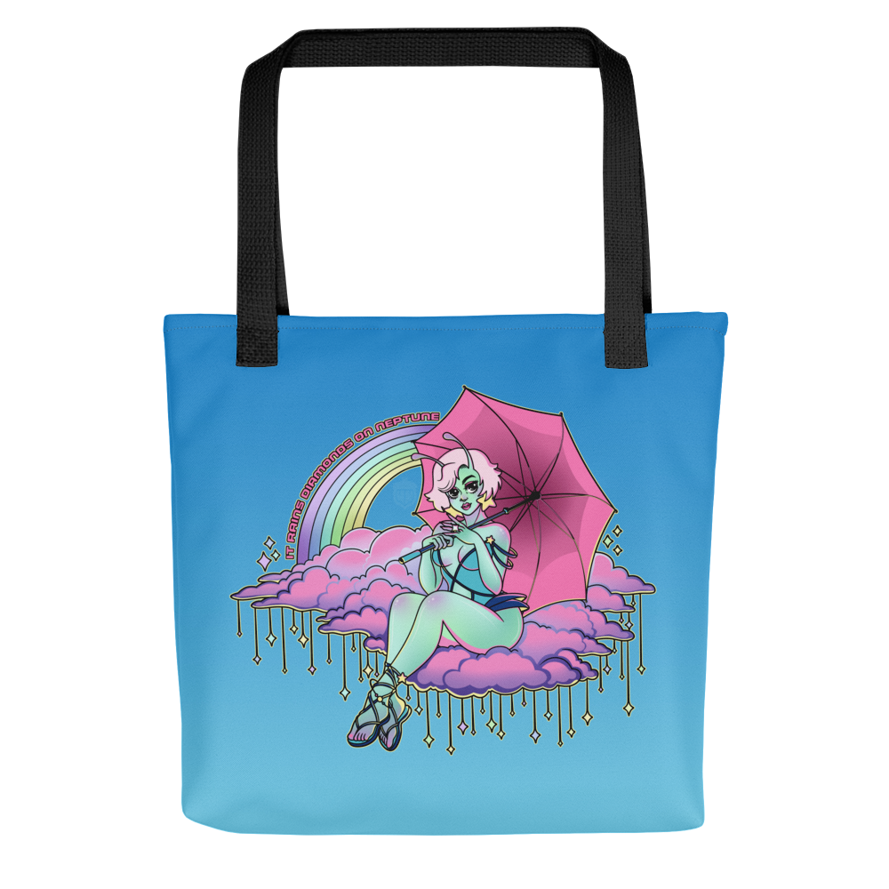 A graphic advertisement of a blue tote bag with a teal alien girl holding an umbrella on a pink cloud. The text reads, "It rains diamonds on neptune."